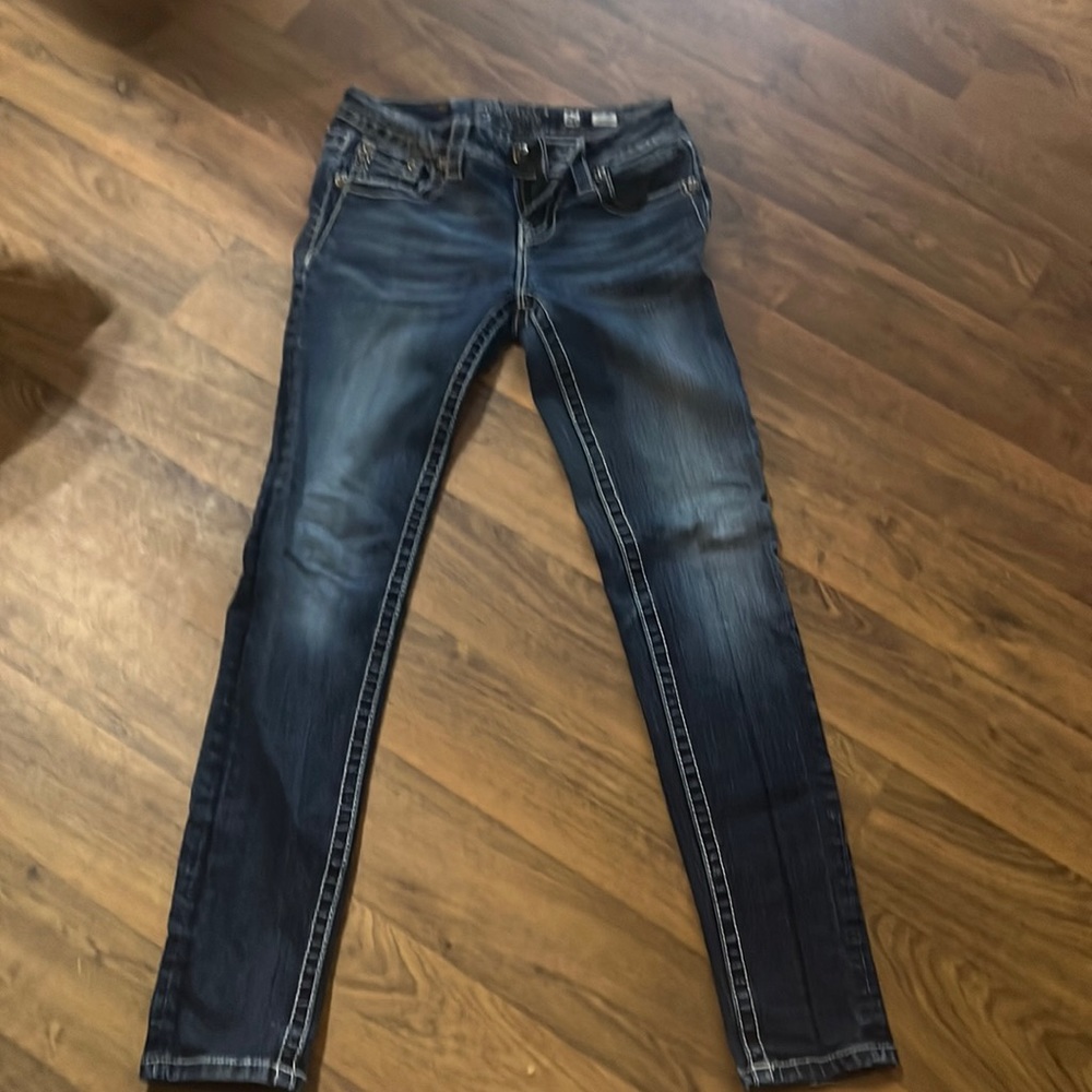 Miss Me Jeans. Size 26. Fair Condition, one button missing on back.
